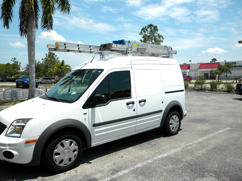 Transit van with ladders on top