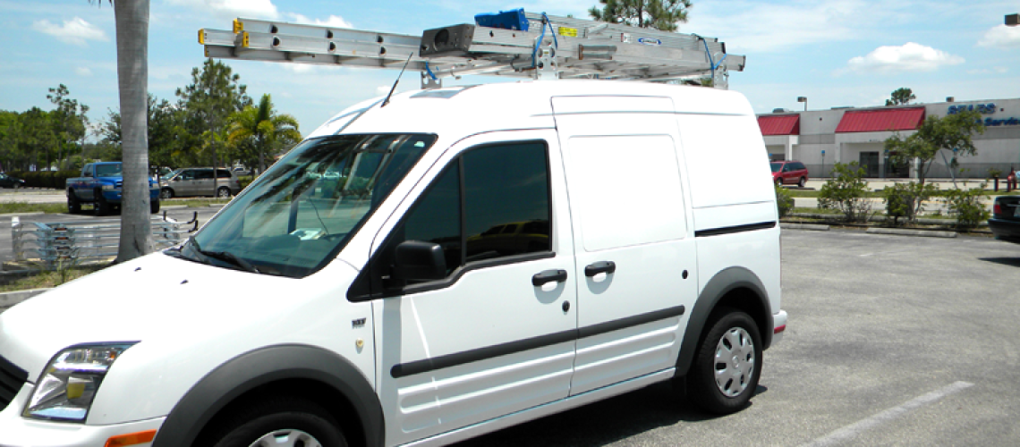 Transit van with ladders on top